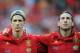 BERN, SWITZERLAND - MAY 30: Fernando Torres (L) of Spain stands with his teammate Sergio Ramos as they listen to their countries national anthem during the international friendly match between Spain and Korea Republic on May 30, 2012 in Bern, Switzerland. (Photo by Jasper Juinen/Getty Images)