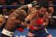 LAS VEGAS, NV - JUNE 09: (R-L) Manny Pacquiao lands a right to the head of Timothy Bradley during their WBO welterweight title fight at MGM Grand Garden Arena on June 9, 2012 in Las Vegas, Nevada. (Photo by Jeff Bottari/Getty Images)