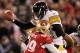 SAN FRANCISCO, CA - DECEMBER 19: Quarterback Ben Roethlisberger #7 of the Pittsburgh Steelers is hit by lineback Aldon Smith #99 of the San Francisco 49ers during the game at Candlestick Park on December 19, 2011 in San Francisco, California. Roethlisberger fumbled on the play. (Photo by Karl Walter/Getty Images)