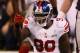 INDIANAPOLIS, IN - FEBRUARY 05: Jason Pierre-Paul #90 of the New York Giants celebrates a play during the first half against the New England Patriots during Super Bowl XLVI at Lucas Oil Stadium on February 5, 2012 in Indianapolis, Indiana. (Photo by Win McNamee/Getty Images)