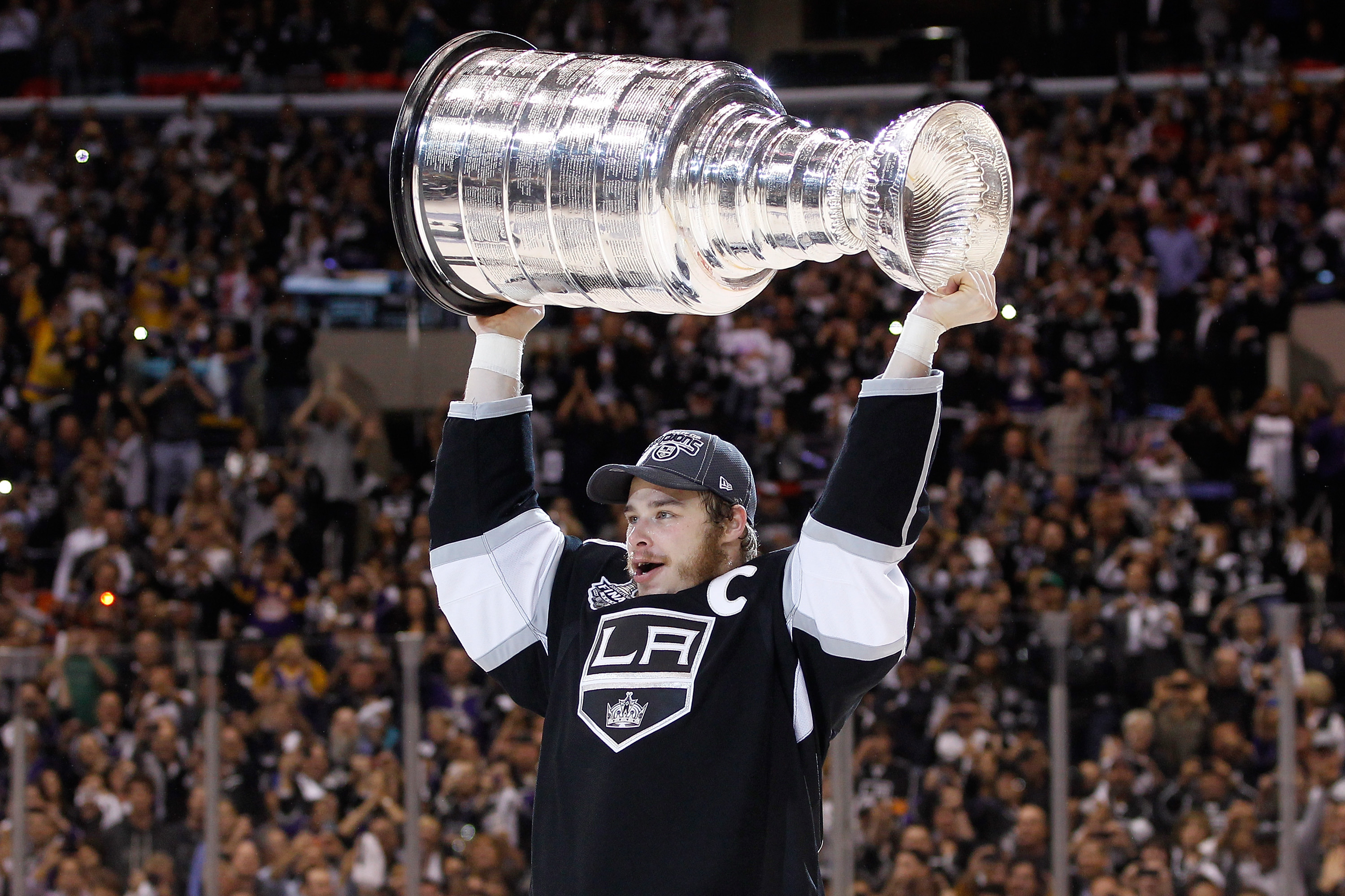 The Cup, held high on the ice  Stanley cup champions, La kings, Cup