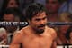 LAS VEGAS, NV - JUNE 09: Manny Pacquiao walks to his corner between rounds during his fight against Timothy Bradley at MGM Grand Garden Arena on June 9, 2012 in Las Vegas, Nevada. (Photo by Jeff Bottari/Getty Images)