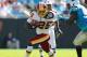 CHARLOTTE, NC - OCTOBER 23: Tim Hightower #25 of the Washington Redskins rushes against the Carolina Panthers at the Bank of America Stadium on October 23, 2011 in Charlotte, North Carolina. (Photo by Dilip Vishwanat/Getty Images)