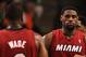 BOSTON, MA - JUNE 07: (L-R) Dwyane Wade #3, LeBron James #6 and Chris Bosh #1 of the Miami Heat react against the Boston Celtics in Game Six of the Eastern Conference Finals in the 2012 NBA Playoffs on June 7, 2012 at TD Garden in Boston, Massachusetts. NOTE TO USER: User expressly acknowledges and agrees that, by downloading and or using this photograph, User is consenting to the terms and conditions of the Getty Images License Agreement. (Photo by Jim Rogash/Getty Images)