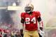 SAN FRANCISCO, CA - JANUARY 22: Anthony Dixon #24 of the San Francisco 49ers runs on the field during player introductions against the New York Giants during the NFC Championship Game at Candlestick Park on January 22, 2012 in San Francisco, California. (Photo by Ezra Shaw/Getty Images)