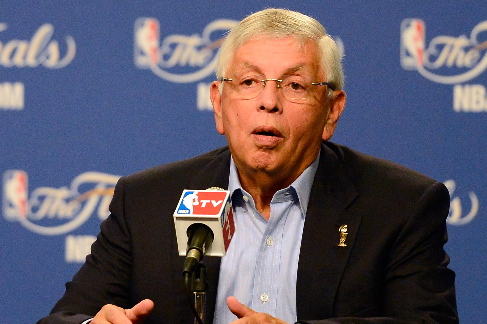 David Stern asks Jim Rome, 'Have you stopped beating your wife yet?' in  response to lottery-fixing question in radio interview