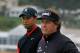 PEBBLE BEACH, CA - FEBRUARY 12: (L-R) Tiger Woods and Phil Mickelson wait on the seventh hole tee during the final round of the AT&T Pebble Beach National Pro-Am at Pebble Beach Golf Links on February 12, 2012 in Pebble Beach, California. (Photo by Jeff Gross/Getty Images)