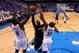 LeBron James driving to the basket in the paint.