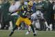 GREEN BAY, WI - DECEMBER 11: Randall Cobb #18 of the Green Bay Packers moves past Lito Sheppard #21 of the Oakland Raiders at Lambeau Field on December 11, 2011 in Green Bay, Wisconsin. The Packers defeated the Raiders 46-16. (Photo by Jonathan Daniel/Getty Images)