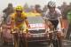 Andy Schleck rides alongside the yellow jersey that should have been his.