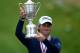 SAN FRANCISCO, CA - JUNE 17: Webb Simpson of the United States poses with the trophy after his one-stroke victory at the 112th U.S. Open at The Olympic Club on June 16, 2012 in San Francisco, California. (Photo by Stuart Franklin/Getty Images)