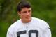 CHARLOTTE, NC - MAY 12: Carolina Panthers first round draft pick Luke Kuechly #59 makes his way to practice at Carolina Panthers Rookie Camp on May 12, 2012 in Charlotte, North Carolina. (Photo by Brian A. Westerholt/Getty Images)