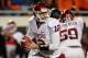 STILLWATER, OK - DECEMBER 03: Landry Jones #12 of the Oklahoma Sooners throws against the Oklahoma State Cowboys at Boone Pickens Stadium on December 3, 2011 in Stillwater, Oklahoma. (Photo by Ronald Martinez/Getty Images)