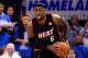 OKLAHOMA CITY, OK - JUNE 14: LeBron James #6 of the Miami Heat reacts with the ball while taking on the Oklahoma City Thunder in Game Two of the 2012 NBA Finals at Chesapeake Energy Arena on June 14, 2012 in Oklahoma City, Oklahoma. NOTE TO USER: User expressly acknowledges and agrees that, by downloading and or using this photograph, User is consenting to the terms and conditions of the Getty Images License Agreement. (Photo by Ronald Martinez/Getty Images)