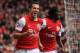 LONDON, ENGLAND - MAY 05: Robin van Persie of Arsenal celebrates scoring their third goal during the Barclays Premier League match between Arsenal and Norwich City at the Emirates Stadium on May 5, 2012 in London, England. (Photo by Bryn Lennon/Getty Images)