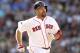 BOSTON, MA - JUNE 9: Kevin Youkilis #20 of the Boston Red Sox runs out a hit during their interleague game against the Washington National at Fenway Park on June 9, 2012 in Boston, Massachusetts. (Photo by Winslow Townson/Getty Images)