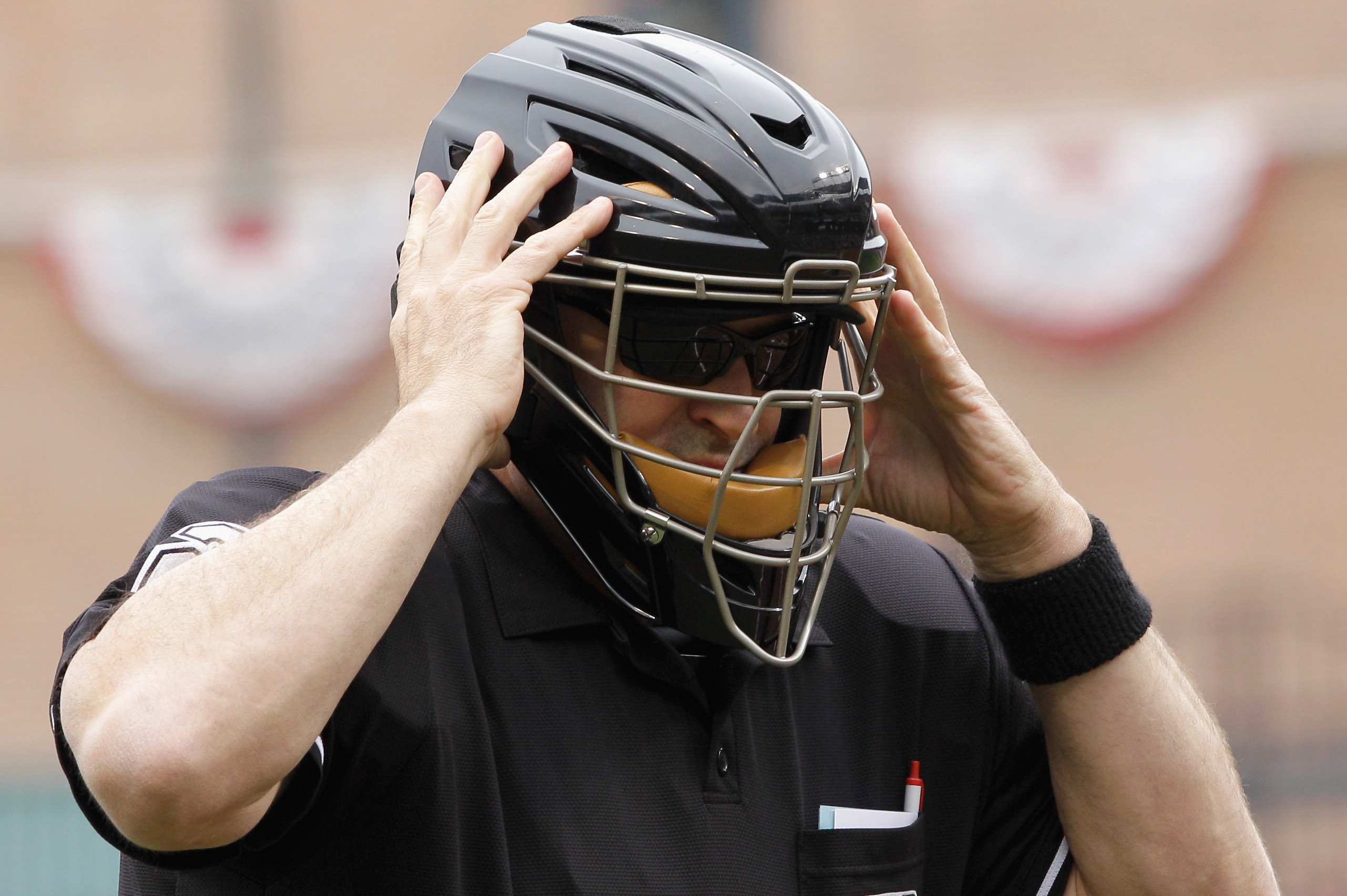 MLB Umpire Head Injury: Mask vs. Helmet Debate and the Value of