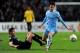 MANCHESTER, ENGLAND - FEBRUARY 22: David Silva of Manchester City competes with James Rodriguez of FC Porto during the UEFA Europa League Round of 32 second leg match between Manchester City and FC Porto at the Etihad Stadium on February 22, 2012 in Manchester, England. (Photo by Michael Regan/Getty Images)