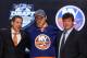 PITTSBURGH, PA - JUNE 22: Griffin Reinhart, fourth overall pick by the New York Islanders, poses on stage with Islanders representatives during Round One of the 2012 NHL Entry Draft at Consol Energy Center on June 22, 2012 in Pittsburgh, Pennsylvania. (Photo by Bruce Bennett/Getty Images)