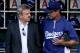 ANAHEIM, CA - JULY 1: Manager Don Mattingly and general manager Ned Colletti of the Los Angeles Dodgers converse in the dugout before the game with the Los Angeles Angels of Anaheim on July 1, 2011 at Angel Stadium in Anaheim, California. (Photo by Stephen Dunn/Getty Images)