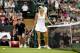 LONDON, ENGLAND - JUNE 27: Caroline Wozniacki of Denmark shows her frustration during her Ladies' singles first round match against Tamira Paszek of Austria on day three of the Wimbledon Lawn Tennis Championships at the All England Lawn Tennis and Croquet Club on June 27, 2012 in London, England. (Photo by Paul Gilham/Getty Images)