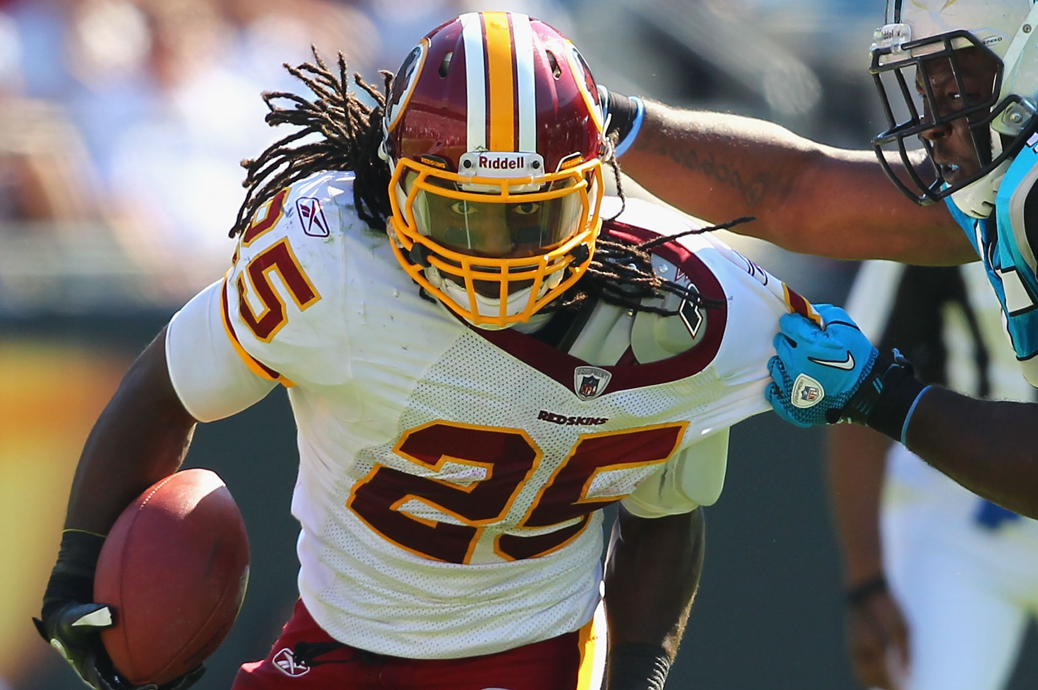 Washington Redskins Stephen Bowen celebrates with Barry Cofield