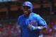 ST. LOUIS, MO - MAY 15: Alfonso Soriano #12 of the Chicago Cubs returns to the dugout after hitting a game-tying home run against the St. Louis Cardinals at Busch Stadium on May 15, 2012 in St. Louis, Missouri. (Photo by Dilip Vishwanat/Getty Images)