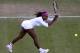 LONDON, ENGLAND - JUNE 28: Serena Williams of the USA in action while playing with Venus Williams during their Ladies' Doubles first round match against Vesna Dolonc of Serbia and Olga Savchuk of Bahamas on day four of the Wimbledon Lawn Tennis Championships at the All England Lawn Tennis and Croquet Club on June 28, 2012 in London, England. (Photo by Julian Finney/Getty Images)