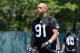 ALAMEDA, CA - MAY 12: Rookie Jack Crawford #91 walks off the field after practice of the Oakland Raiders Rookie Minicamp on May 12, 2012 at the Oakland Raiders Training Facility in Alameda, California. (Photo by Thearon W. Henderson/Getty Images)