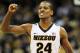 KANSAS CITY, MO - MARCH 10: Kim English #24 of the Missouri Tigers reacts in the first half against the Baylor Bears during the championship game of the 2012 Big 12 Men's Basketball Tournament at Sprint Center on March 10, 2012 in Kansas City, Missouri. (Photo by Jamie Squire/Getty Images)
