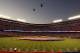 ARLINGTON, TX - OCTOBER 23: Two CH-47 Chinook Helicopters from the Texas Army National Guard fly over during the performance of the Star Spangled Banner prior to Game Four of the MLB World Series between the St. Louis Cardinals and the Texas Rangers at Rangers Ballpark in Arlington on October 23, 2011 in Arlington, Texas. (Photo by Ezra Shaw/Getty Images)