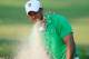 BETHESDA, MD - JUNE 30: Tiger Woods chips from the bunker to the 14th green during Round Three of the AT&T National at Congressional Country Club on June 30, 2012 in Bethesda, Maryland. (Photo by Patrick McDermott/Getty Images)