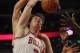 CHICAGO, IL - MARCH 24: Omer Asik #3 of the Chicago Bulls battles for a rebound with Aaron Gray #34 of the Toronto Raptors at the United Center on March 24, 2012 in Chicago, Illinois. The Bulls defeated the Raptors 102-101 in overtime. NOTE TO USER: User expressly acknowledges and agrees that, by downloading and or using this photograph, User is consenting to the terms and conditions of the Getty Images License Agreement. (Photo by Jonathan Daniel/Getty Images)