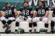 PHILADELPHIA, PA - SEPTEMBER 25: Offensive players Kyle DeVan #68, Jason Kelce #62, Evan Mathis #69, and Jason Peters #71 of the Philadelphia Eagles sit on the bench during the fourth quarter against the New York Giants at Lincoln Financial Field on September 25, 2011 in Philadelphia, Pennsylvania. The Giants defeated the Eagles 29-16. (Photo by Rob Carr/Getty Images)