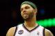 NEWARK, NJ - APRIL 10: Deron Williams #8 of the New Jersey Nets looks on in the second half against the Philadelphia 76ers at Prudential Center on April 10, 2012 in Newark, New Jersey. NOTE TO USER: User expressly acknowledges and agrees that, by downloading and or using this photograph, User is consenting to the terms and conditions of the Getty Images License Agreement. (Photo by Chris Chambers/Getty Images)