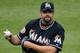 NEW YORK, NY - APRIL 26: Heath Bell #21 of the Miami Marlins looks on during the game against the New York Mets at Citi Field on April 26, 2012 in the Flushing neighborhood of the Queens borough of New York City. Mets defeated the Marlins 3-2. (Photo by Mike Stobe/Getty Images)