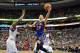 PHILADELPHIA, PA - MARCH 21: Jeremy Lin #17 of the New York Knicks lays up a shot over Elton Brand #42 of the Philadelphia 76ers at the Wells Fargo Center on March 21, 2012 in Philadelphia, Pennsylvania. The Knicks won 82-79. NOTE TO USER: User expressly acknowledges and agrees that, by downloading and or using this photograph, User is consenting to the terms and conditions of the Getty Images License Agreement. (Photo by Drew Hallowell/Getty Images)