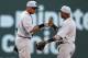 BOSTON, MA - APRIL 20: Derek Jeter #2 and Robinson Cano #24 of the New York Yankees celebrate a win against the Boston Red Sox at Fenway Park April 20, 2012 in Boston, Massachusetts. (Photo by J. Rogash/Getty Images)