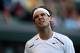 LONDON, ENGLAND - JUNE 28: Rafael Nadal of Spain reacts during his Gentlemen's Singles second round match against Lukas Rosol of the Czech Republic on day four of the Wimbledon Lawn Tennis Championships at the All England Lawn Tennis and Croquet Club on June 28, 2012 in London, England. (Photo by Clive Rose/Getty Images)
