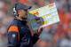 DENVER - SEPTEMBER 14: Quarterback coach Jeremy Bates of the Denver Broncos gives direction against the San Diego Chargers during NFL action at Invesco Field at Mile High on September 14, 2008 in Denver, Colorado. The Broncos defeated the Chargers 39-38. (Photo by Doug Pensinger/Getty Images)