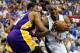 ORLANDO, FL - JUNE 14: Dwight Howard #12 of the Orlando Magic drives on Andrew Bynum #17 of the Los Angeles Lakers in the third quarter of Game Five of the 2009 NBA Finals on June 14, 2009 at Amway Arena in Orlando, Florida. NOTE TO USER: User expressly acknowledges and agrees that, by downloading and or using this photograph, User is consenting to the terms and conditions of the Getty Images License Agreement. (Photo by Ronald Martinez/Getty Images)