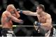 LAS VEGAS - NOVEMBER 21: Tito Ortiz (L) battles Forrest Griffin (R) during their Light Heavyweight Fight at the UFC 106 at Mandalay Bay Events Center on November 21, 2009 in Las Vegas, Nevada. (Photo by Jon Kopaloff/Getty Images)