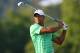 WHITE SULPHUR SPRINGS, WV - JULY 6: Tiger Woods hits his second shot on the 12th hole during the second round of the Greenbrier Classic at the Old White TPC on July 6, 2012 in White Sulphur Springs, West Virginia. (Photo by Hunter Martin/Getty Images)