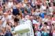 LONDON, ENGLAND - JULY 06: Novak Djokovic of Serbia shows his dejection as he salutes the crowd after losing his Gentlemen's Singles semi final match against Roger Federer of Switzerland on day eleven of the Wimbledon Lawn Tennis Championships at the All England Lawn Tennis and Croquet Club on July 6, 2012 in London, England. (Photo by Clive Rose/Getty Images)