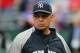 ARLINGTON, TX - OCTOBER 22: Baseball Hall of Famer Reggie Jackson looks on during batting prior to the New York Yankees playing against the Texas Rangers in Game Six of the ALCS during the 2010 MLB Playoffs at Rangers Ballpark in Arlington on October 22, 2010 in Arlington, Texas. (Photo by Stephen Dunn/Getty Images)