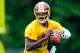 ASHBURN, VA - MAY 06: Robert Griffin III #10 of the Washington Redskins drops back to make a pass during the Washington Redskins rookie minicamp on May 6, 2012 in Ashburn, Virginia. (Photo by Patrick McDermott/Getty Images)