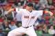 BOSTON, MA - MAY 14: Jon Lester #31 of the Boston Red Sox throws against the Seattle Mariners in the first inning at Fenway Park May 14, 2012 in Boston, Massachusetts. (Photo by Jim Rogash/Getty Images)