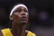LOS ANGELES - OCTOBER 21: Kwame Brown #54 of the Los Angeles Lakers shoots a free throw during the game against the Charlotte Bobcats on October 21, 2005 at Staples Center in Los Angeles, California. NOTE TO USER: User expressly acknowledges and agrees that, by downloading and or using this photograph, User is consenting to the terms and conditions of the Getty Images License Agreement. (Photo by Lisa Blumenfeld/Getty Images)
