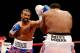 LONDON, ENGLAND - JULY 14: David Haye (L) in action with Dereck Chisora during their vacant WBO and WBA International Heavyweight Championship bout on July 14, 2012 in London, England. (Photo by Scott Heavey/Getty Images)