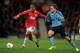 MANCHESTER, ENGLAND - FEBRUARY 23: Christian Eriksen of Ajax challenges Ashley Young of Manchester United during the UEFA Europa League Round of 32 second leg match between Manchester United and AFC Ajax at Old Trafford on February 23, 2012 in Manchester, England. (Photo by Michael Regan/Getty Images)